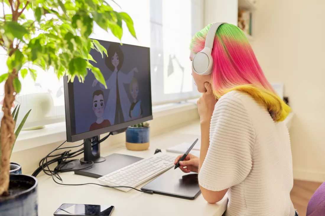 girl-teenager-artist-headphones-drawing-computer-using-graphics-tablet